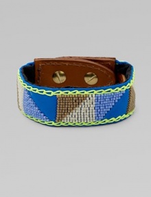 Beautiful, colorful beads on supple leather with a whip stitch border. Glass beasdLeatherLength, about 9Studded closureImported Beautiful, colorful beads on supple leather with a whip stitch border. Glass beasdLeatherLength, about 9Studded closureImported