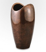 The rounded shape of this handcrafted vase has classic appeal whether you're given to a single bud, a well-edited bouquet or a wild bunch of flowers. And its bronze-finish alloy is a refreshing change from more traditional glass silhouettes. From the Heritage Pebble CollectionAntique copper-plated alloy10H X 5¼ diam.Wipe cleanImported