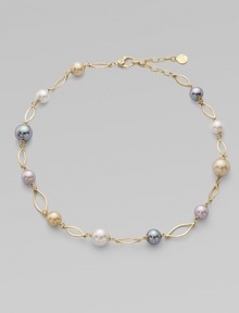 A gorgeous blend of different colored pearls with 18k goldplated sterling silver links. 10mm and 12mm round white, champagne, grey and black organic hand-made pearls 18k goldplated sterling silver Lobster clasp closure Length, about 16 to 18 adjustable Imported A gorgeous blend of different colored pearls with 18k goldplated sterling silver links. 10mm and 12mm round white, champagne, grey and black organic hand-made pearls 18k goldplated sterling silver Lobster clasp closure Length, about 16 to 18 adjustable Imported