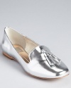 A shoe in shining armor, Dolce Vita's Nalla Tassel smoking shoes show off in mirrored specchio leather.