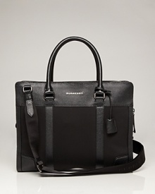 A modern man essential, this handsome briefcase adjusts perfectly to your needs with excellent organizational pockets and an adjustable strap for longer journeys. A modern man essential, this handsome briefcase adjusts perfectly to your needs with excellent organizational pockets and an adjustable strap for longer journeys.