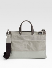 Tarp cloth canvas that softens and fades over time, constructed with 3-ply cotton yarns and dipped in rubber latex for unmatched durability. Zip closure Waxwear handles Adjustable, removable shoulder strap Signature rivet detail Exterior, interior organizing pockets 17½W x 12½H X 3½D Imported Tarp cloth canvas that softens and fades over time, constructed with 3-ply cotton yarns and dipped in rubber latex for unmatched durability. Zip closure Waxwear handles Adjustable, removable shoulder strap Signature rivet detail Exterior, interior organizing pockets 17½W x 12½H X 3½D Imported