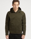 Offering a hint of stylish sheen, a hooded jacket with a concealed front zipper for a sleek look.Attached hoodConcealed front zipperZippered front pocketAbout 26 from shoulder to hemPolyesterHand washImported