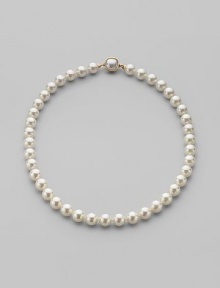 A classic strand of white organic man-made pearls is essential elegance. 10mm white round pearls Length, about 18 18k gold vermeil and mabé pearl push-lock clasp Made in Spain A classic strand of white organic man-made pearls is essential elegance. 10mm white round pearls Length, about 18 18k gold vermeil and mabé pearl push-lock clasp Made in Spain