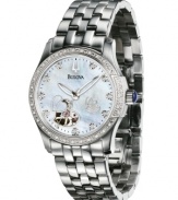 Beauty that makes your heart skip a beat. This gorgeous Bulova watch features a stainless steel bracelet and case. Diamond-accented bezel. White mother-of-pearl dial with logo, diamond accents at indices and heart-shaped window. Automatic movement. Water resistant to 30 meters. Three-year warranty.