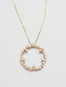 Sparkling white sapphires set in 14k gold with a open circle design on a delicate link chain. White sapphire14k goldLength, about 16Pendant size, about .6 Spring ring closureMade in USA Sparkling white sapphires set in 14k gold with a open circle design on a delicate link chain. White sapphire14k goldLength, about 16Pendant size, about .6 Spring ring closureMade in USA