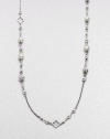 From the Quatrefoil Collection. An extra long sterling silver chain with bead and quatrefoil stations.Sterling silver Can be worn doubled Length, about 48 Lobster clasp closure Imported 