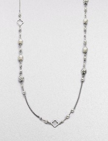 From the Quatrefoil Collection. An extra long sterling silver chain with bead and quatrefoil stations.Sterling silver Can be worn doubled Length, about 48 Lobster clasp closure Imported From the Quatrefoil Collection. An extra long sterling silver chain with bead and quatrefoil stations.Sterling silver Can be worn doubled Length, about 48 Lobster clasp closure Imported