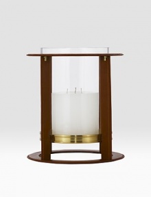 Crafted from gleaming glass, and encased in a supple saddle leather frame to evoke a heritage panache.12 L x 14¼ H6 X 6 candle recommendedLeather, glass and brassImported Crafted from gleaming glass, and encased in a supple saddle leather frame to evoke a heritage panache.12 L x 14¼ H6 X 6 candle recommendedLeather, glass and brassImported