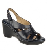 A solid wedge heel and sturdy strap detailing makes Naturalizer's Kirina slingback wedge sandals a perfectly practical choice for your summer wardrobe. With a round-toe silhouette, they're equipped with a secure adjustable buckle closure for support.
