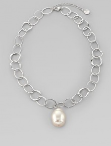 A large, lustrous white pearl drop dangles with creamy iridescence from a silvery chain of hammered open links. 22mm white baroque organic man-made pearl Rhodium-plated sterling silver Length, about 16, with 2 extender Lobster clasp Made in Spain A large, lustrous white pearl drop dangles with creamy iridescence from a silvery chain of hammered open links. 22mm white baroque organic man-made pearl Rhodium-plated sterling silver Length, about 16, with 2 extender Lobster clasp Made in Spain