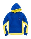 Rendered in soft fleece for maximum comfort and warmth, this pullover hoodie features a bold splash of neon color for a sporty accent.