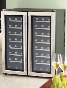 The perfect accessory for any wine lover has two compartments, each with separate temperature controls for reds and whites. The perfect accessory for any wine lover has two compartments, each with separate temperature controls for reds and whites.