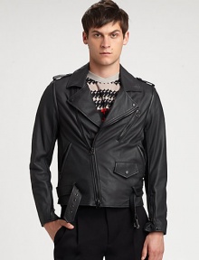 Made from butter-soft Italian leather, this edgy jacket offers style versatility, thanks to its detachable sleeves.Notched collarDetachable sleevesEpaulettesAsymmetrical zipper detailsChest and slash pocketsAbout 25 from shoulder to hemLambskinDry clean by leather specialistImported of Italian fabric Made from butter-soft Italian leather, this edgy jacket offers style versatility, thanks to its detachable sleeves.Notched collarDetachable sleevesEpaulettesAsymmetrical zipper detailsChest and slash pocketsAbout 25 from shoulder to hemLambskinDry clean by leather specialistImported of Italian fabric