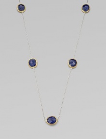 Rich lapis stations set in 24k gold on a sterling silver link chain for a truly elegant style. Lapis24k goldSterling silverLength, about 39½Lobster clasp closureImported Rich lapis stations set in 24k gold on a sterling silver link chain for a truly elegant style. Lapis24k goldSterling silverLength, about 39½Lobster clasp closureImported