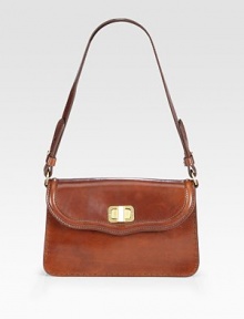 Rich saddle leather in a graceful, classic shape with a front turnlock flap.Shoulder strap, 10 drop Turnlock flap closure One inside zip pocket Suede lining 9½W X 6H X 2D Made in Italy Rich saddle leather in a graceful, classic shape with a front turnlock flap.Shoulder strap, 10 drop Turnlock flap closure One inside zip pocket Suede lining 9½W X 6H X 2D Made in Italy