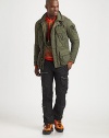 Designed for featherweight warmth and durable wear, a diamond-quilted taffeta jacket features numerous cargo pockets for handy storage, plus utility drawcords, 40 grams of filling and exposed seams for an allover rugged quality.