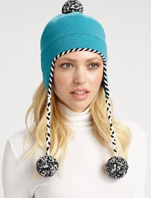 A new twist on this merino wool, cold weather essential with speckled pom-poms and twisted ties.Merino WoolAbout 5L X 4WHand washImported A new twist on this merino wool, cold weather essential with speckled pom-poms and twisted ties.Merino WoolAbout 5L X 4WHand washImported