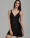 Feel your most sultry in this rayon and lace chemise with a keyhole closure.