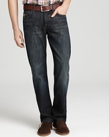 Five pocket jeans have a natural waist and are roomy through the hip and thigh, opening into a bootcut hem. Features 7 for All Mankind's signature squiggle embroidery on back pockets. In a dark wash with slight fading in the thigh and rear. Five pocket jeans have a natural waist and are roomy through the hip and thigh, opening into a bootcut hem. Features 7 for All Mankind's signature squiggle embroidery on back pockets. In a dark wash with slight fading in the thigh and rear.