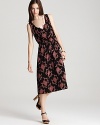 Infuse your weekend wardrobe with boho chic. This rich MARC BY MARC JACOBS dress flaunts a dramatic floral print on a flowing silhouette for effortless evening impact.