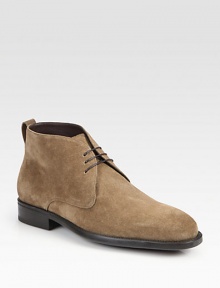 This lace-up chukka exudes casual cool, rendered in a rich suede with a supportive rubber sole for maximum comfort.Ankle pull tabSuede upperLeather liningPadded insoleRubber soleMade in Italy