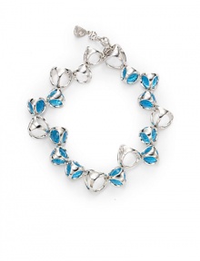 THE LOOKBlue quartz beads Cutout link accents Rhodium-plated sterling silver settingSignature Tridara claspTHE MEASUREMENTLength, about 7.5ORIGINImported