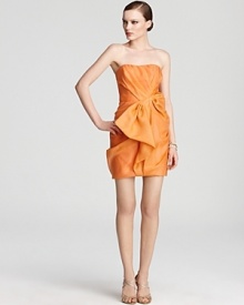 Origami-like ruffles elevate this vibrantly hued ABS by Allen Schwartz strapless dress to an art form.