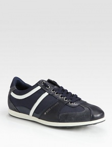 Rich suede and leather duo with side logo detail, ideal for sporting around town in style.Leather/textile upperPadded insoleRubber soleImported Rich suede and leather duo with side logo detail, ideal for sporting around town in style.Leather/textile upperPadded insoleRubber soleImported