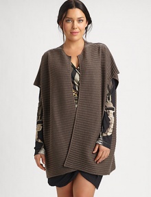 Offering a flattering relaxed fit, this wool vest features classic ribbing. Pair this muted cocoon design with a printed top or dress.Open-front designShort sleevesAbout 32 from shoulder to hemWoolDry cleanMade in Italy Offering a flattering relaxed fit, this wool vest features classic ribbing. Pair this muted cocoon design with a printed top or dress.Open-front designShort sleevesAbout 32 from shoulder to hemWoolDry cleanMade in Italy
