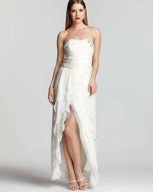 A gorgeously draped, rhinestone-embellished bodice tops off a multi-tiered skirt in this divine creation from ABS by Allen Schwartz. A gorgeously draped, rhinestone-embellished bodice tops off a multi-tiered skirt in this divine creation from ABS by Allen Schwartz.