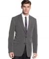 Find the lighter side of business with this sharp slim-fit grey Calvin Klein jacket.