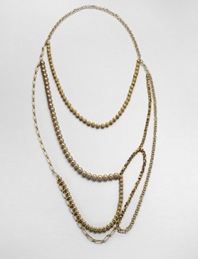 An artistic and modern design with faceted and smooth beads and various link chains in an abstract style. Glass and acrylic beadsGoldtone brassLength, about 47Slip-on styleImported An artistic and modern design with faceted and smooth beads and various link chains in an abstract style. Glass and acrylic beadsGoldtone brassLength, about 47Slip-on styleImported
