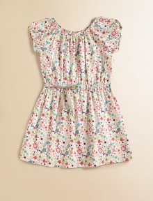 A bright and fun floral print with easy peasant styling on pure cotton.Elasticized gathered necklineCap raglan sleeves with elasticized openings/li> Drawstring waist with ribbon tiesPullover stylingCottonMachine washImported A bright and fun floral print with easy peasant styling on pure cotton.Elasticized gathered necklineCap raglan sleeves with elasticized openings/li> Drawstring waist with ribbon tiesPullover stylingCottonMachine washImported