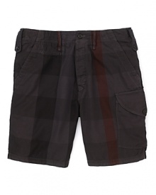 Utility, refined. This handsome cargo short is rendered in a rich check pattern, with button tab beltloops at the hip and a contoured cargo pocket at the left. Utility, refined. This handsome cargo short is rendered in a rich check pattern, with button tab beltloops at the hip and a contoured cargo pocket at the left.