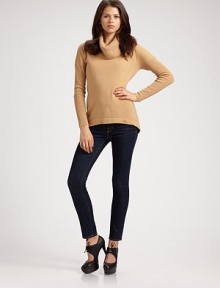 Luxurious cashmere cowlneck with ribbed details and a hi-low hem. Ribbed cowlneck Long ribbed sleeves Hi-low hem Cashmere Dry clean Imported Luxurious cashmere cowlneck with ribbed details and a hi-low hem. Ribbed cowlneck Long ribbed sleeves Hi-low hem Cashmere Dry clean Imported