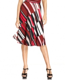 Be memorable in Ellen Tracy's A-line skirt, featuring a colorblocked stripe print and swingy silhouette. Pair it with the matching top to make a flawless ensemble! Be memorable in Ellen Tracy's A-line skirt, featuring a colorblocked stripe print and swingy silhouette. Pair it with the matching top to make a flawless ensemble!