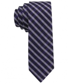 Enter the stripe zone with sleek style. This skinny tie from Calvin Klein lets you power up with a pattern play. Enter the stripe zone with sleek style. This skinny tie from Calvin Klein lets you power up with a pattern play.