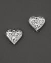 Elegant diamond-encrusted heart earring in 18 Kt. white gold, with signature ruby accent. Designed by Roberto Coin.