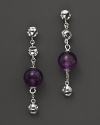 Bold sterling silver earrings set with amethysts showcase Di MODOLO's unique Triadra cages.