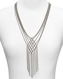 Jazz up your look with this multi strand beaded necklace from ABS bu Allen Schwartz, boasting a woven center and bold fringe detailing.