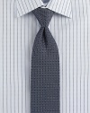 A sophisticated look woven in Italian silk, with a polished diamond pattern.SilkDry cleanMade in Italy