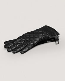 Chic quilted lambskin gloves with soft cotton lining and zipper detail at wrist. Chic quilted lambskin gloves with soft cotton lining and zipper detail at wrist.
