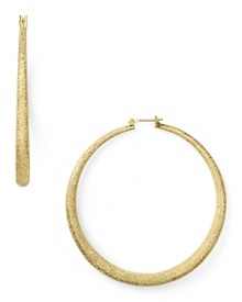 These ABS by Allen Schwartz gold hoops dazzle the classic silhouette with a distinctive shimmery texture.