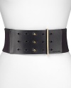 Structure sleek body-con silhouettes with this MICHAEL Michael Kors belt, combining edgy elastic and leather for serious waist-cinching that lets you breathe.