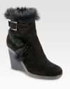 Practical yet fashion-forward, a heightened suede ankle boot trimmed with lush rabbit fur. Rubber wedge, 3¾ (95mm)Rubber platform, ½ (15mm)Compares to a 3¼ heel (80mm)Weatherproof suede upper with rabbit fur trimAdjustable buckle strap and inside zipBreathable microfiber liningSlip resistant rubber solePadded insoleMade in Italy