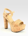 Natural cork platform sandal with a slight metallic finish and an adjustable ankle strap. Self-covered heel, 5 (125mm)Covered platform, 2 (50mm)Compares to a 3 heel (75mm)Metallic cork upperLeather liningRubber solePadded insoleImported