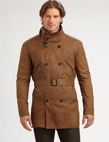 A double-breasted coat with a classic belted look and convenient double back vent.Stand collarBelted styleSlash pocketsDouble back ventAbout 33 from shoulder to hem80% cotton/20% nylonDry cleanMade in USA A double-breasted coat with a classic belted look and convenient double back vent.Stand collarBelted styleSlash pocketsDouble back ventAbout 33 from shoulder to hem80% cotton/20% nylonDry cleanMade in USA
