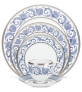 Set a tone of opulence and grace with the Sonnet in Blue place setting. Patterned platinum bands and powder-blue botanicals frame traditional bone china from Noritake.