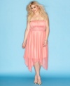 Make your night magical with Trixxi's strapless plus size dress, finished by a handkerchief hem.